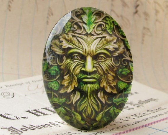 Celtic Green Man, 40x30mm glass oval cabochon, artisan crafted, pagan mythology, spirit of the forest, Beltane, spring plant growth