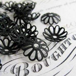 Petite black daisy, small flower, delicate bead cap, 10mm open petals, antiqued brass (6 bead caps) oxidized aged patina