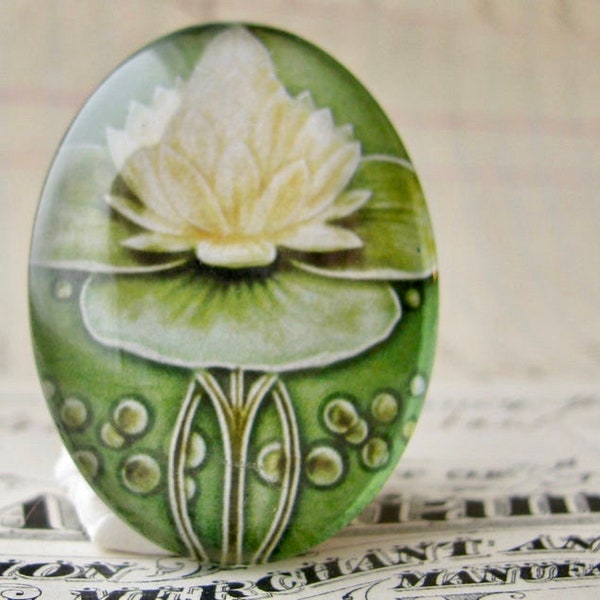 Art Nouveau ceramic tile image under glass dome, handmade 40x30mm oval cabochon, Belle Époque, white water lily flower, green stem