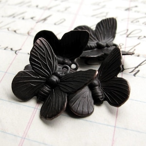 Black butterfly charms, black antiqued brass (4) made in the USA