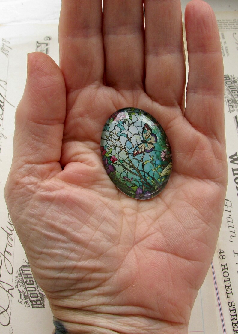 Stained glass butterfly garden handmade glass oval cabochon, 40x30mm, window, rebirth, renewal, flower, vine, winged insect, wings image 2