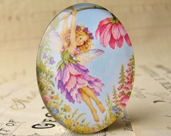 NEW! Fairy swinging on a flower in a meadow, 40x30mm glass oval cabochon, exclusive to Fallen Angel Brass, handmade in this shop