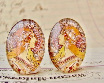 From 1896 mirrored pair of Mucha's "Zodiac" handmade cabochons, 25x18mm, glass oval face cabochon, orange, Art Nouveau