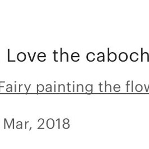 May include: Five star review for a handmade fairy painting the flowers. The review says "Just beautiful. Love the cabochons here." and is dated March 12, 2018.