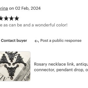 May include: Three black metal pendant drops with ornate designs. The pendants are connected by small rings. The pendants are on a white background with black text.