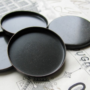 25mm round brass bezel cup settings, flat plain edge, black antiqued brass blanks (4 bezels) black bezels, bottle cap size, bottlecap tray