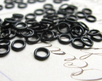 Tiny 4mm jump ring black antiqued brass (50 rings) aged oxidized patina, 24 gauge, made in the USA, small open jump rings