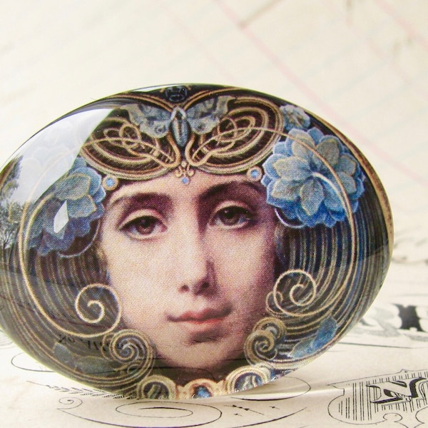 From 1905, handmade glass cabochon "Mask" by Louis Hawkins, 40x30mm oval, horizontal, woman face, blue, swirls, Art Nouveau