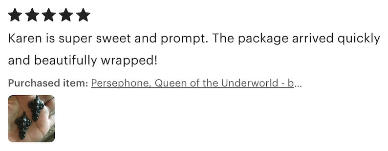 May include: Black earrings with a cluster of small black beads. The earrings are on a hand, and the caption reads "Persephone, Queen of the Underworld - b..."