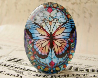 Stained glass Monarch butterfly, handmade glass oval cabochon, 40x30mm, garden, rebirth, renewal