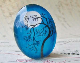 Tree silhouette against a full moon, 40x30mm handmade glass oval cabochon, blue sky, night sky, twilight, mystical, blue moon