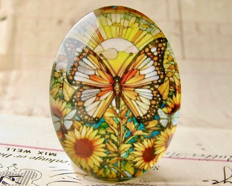 Stained glass butterfly and sunflowers, handmade glass oval cabochon, 40x30mm, garden, rebirth, renewal, winged, wings image 1