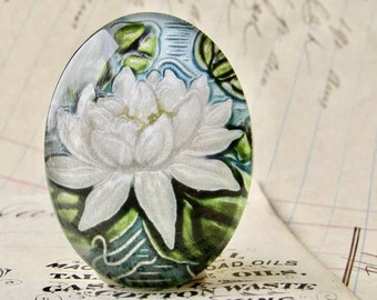 White lily flower, green stem, Art Nouveau ceramic tile image under glass dome, handmade 40x30mm glass oval cabochon, Belle Époque