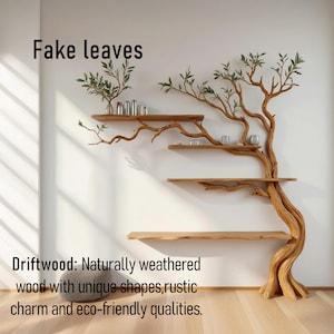 K&ouml;nnte beinhalten: Einzigartiges Wandregal in Form eines Baumes aus hellbraunem Holz. Das Design zeigt Regale, die sich vom Stamm aus erstrecken, mit dem Text "Fake leaves" oben. Der Text "Driftwood" befindet sich unten und beschreibt die Eigenschaften des Holzes.