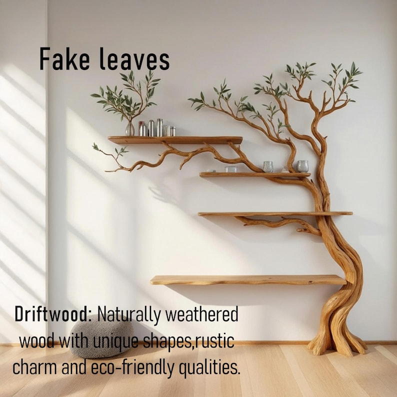 K&ouml;nnte beinhalten: Einzigartiges Wandregal in Form eines Baumes aus hellbraunem Holz. Das Design zeigt Regale, die sich vom Stamm aus erstrecken, mit dem Text "Fake leaves" oben. Der Text "Driftwood" befindet sich unten und beschreibt die Eigenschaften des Holzes.