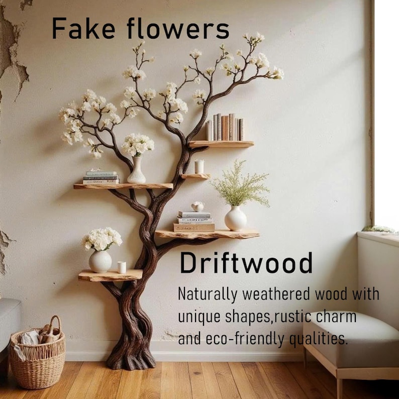 Puede incluir: Estanter&iacute;a con forma de &aacute;rbol de madera flotante con m&uacute;ltiples estantes de madera y un tronco marr&oacute;n oscuro. Los estantes contienen libros, jarrones con flores blancas y vegetaci&oacute;n. El texto "Fake flowers" y "Driftwood" son visibles.