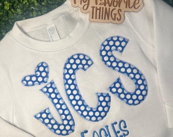 Sudadera con apliques personalizados