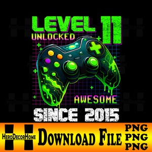 May include: A black graphic with a neon green and purple grid background. The text reads "LEVEL 11 UNLOCKED AWESOME SINCE 2015" with a controller graphic. The controller is black with neon green accents and buttons.