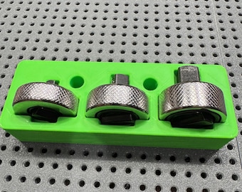 Soporte de trinquete con rueda de pulgar