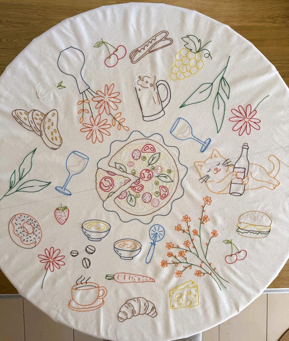 Hand-Embroidered Linen Tablecloth: 64 inch Round, Playful Motifs – Handmade Pizza Party & Food Theme – Fun Dining Table Linen