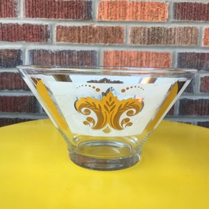 Mid Century Bowl featuring Frosted Glass and a Fleur de Lis in Gold