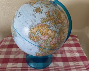 Globemaster 12 inch diameter Globe with blue plastic base.