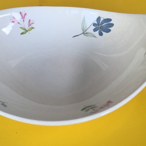 Eva Zeisel designed this classic &quot;lug&quot; bowl shape in the 1950s for the Hallcraft China Company.