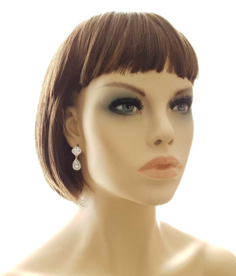 Emy crystal earrings petite main image 0