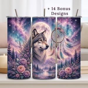 May include: A set of three stainless steel insulated tumblers with a nature-themed design. The tumblers feature a wolf, dreamcatcher, and floral elements against a starry night sky background. The text "+ 14 Bonus Designs" is visible at the top.