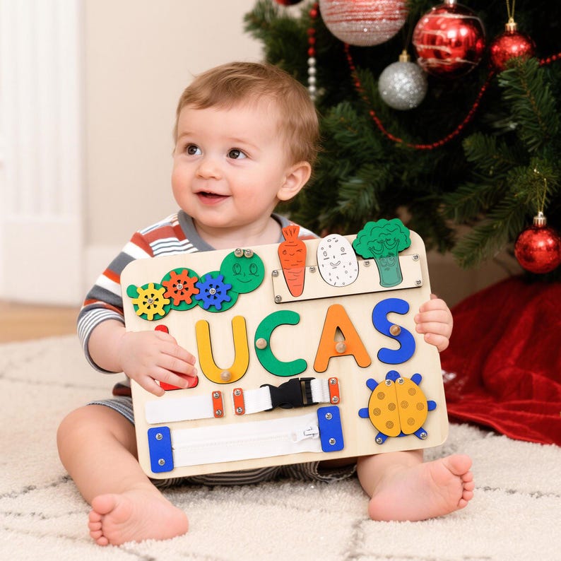 May include: A wooden educational toy with the name "LUCAS" spelled out in colorful letters. The board features various interactive elements, including gears, a zipper, a buckle, and vegetable-shaped pieces. The toy is designed for early learning and development.
