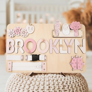 Personalized Baby Name Puzzle, Custom Kids Busy Board, Early Learning Puzzle, Baby Room Decor, Birthday Gift for Kids, Baby Shower Gift
Wide Theme Selection: From animals and vehicles to nature and space – explore our full range to suit every interest and age. Perfect for learning through play.
Gift-Ready Options:Ideal for birthdays, holidays, and special occasions. Add gift wrapping. It can also be used as a nursery decoration and is the perfect gift for any occasion!