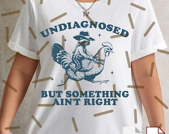 Undiagnosed But Something Ain’t Right PNG Svg, Funny Raccoon Digital File, Cowboy Raccoon Graphic, Humorous Printable Shirt Design