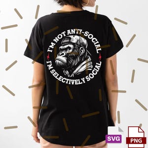 May include: Black t-shirt with a graphic of a gorilla wearing a cap. The text around the gorilla reads "I'm not anti-social, I'm selectively social". The design is in white with a red lightning bolt accent.