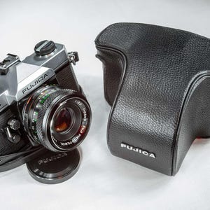 Fujica 35mm Occasion Appareil Photo Reflex Argentique Fujica ST605n - Monture M42 - 35mm - Occasion Avec Accessoires Appareil Argentique M42