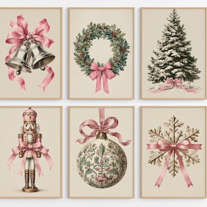 May include: A set of six framed wall art prints featuring holiday themes including silver bells with a pink ribbon, a green wreath with a pink bow, a snow-covered pine tree, a pink nutcracker, a patterned ornament, and a snowflake with a pink bow.