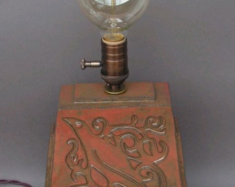 Vintage Edison bulb lamp, on a stoneware base with an Art Nouveau bird design