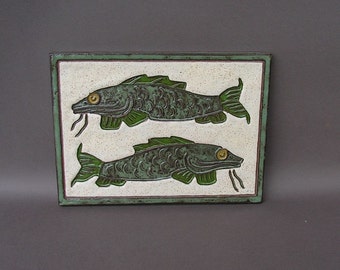 Stoneware tile with two green carp