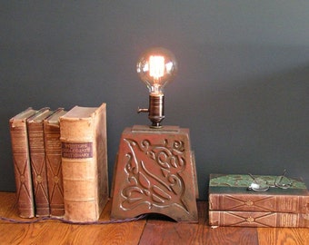 Stoneware lamp with vintage Edison bulb, indented Art Nouveau design of a bird, with copper glaze