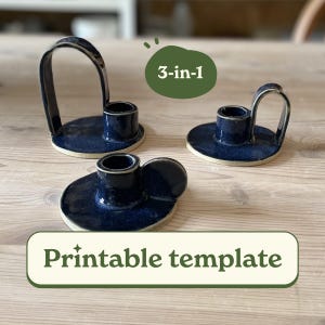 May include: Three ceramic candle holders with a dark blue glaze and a cream-colored base are displayed on a wooden surface. Each holder has a circular base, a cylindrical cup for the candle, and a handle. The text "3-in-1" and "Printable template" are also visible.