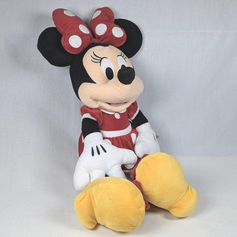 Minnie Mouse Japanese Plush w/ Tags 17" Disney World Plush Kids Children's Baby Toy Stuffed Educational Toy Disneyland Walt Disney Park. Extremely rare 17" Disneyland Tokyo Japan Minnie Mouse plush with tags. Some very minor to wear throughout due to age and wear. No apparent odours or staining. Don't miss your opportunity to add this wonderful pushy to your growing Disney, Disney World, Disneyland collection!