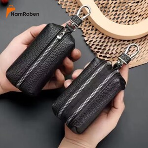 Leren sleutelhouderzakje – PU-sleutelhangerportemonnee met dubbele ritssluiting voor heren, compacte sleuteletui met metalen clip, minimalistische zakorganizer