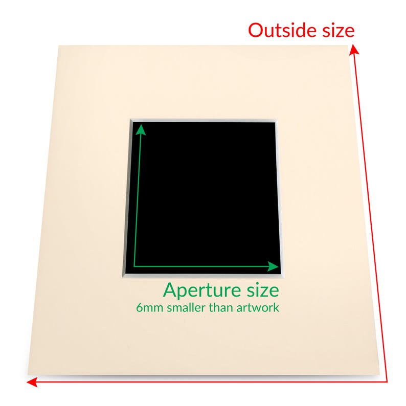 May include: A cream-colored mat with a black rectangular opening. The mat has text that reads "Aperture size 6mm smaller than artwork".