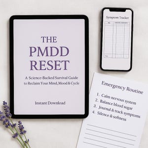 May include: A digital tablet displays "THE PMDD RESET" with the subtitle "A Science-Backed Survival Guide to Reclaim Your Mind, Mood & Cycle." A smartphone shows a symptom tracker. A paper lists an emergency routine.