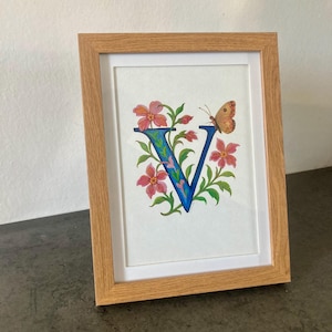 Original illustration of initial letter V in a lovely floral design