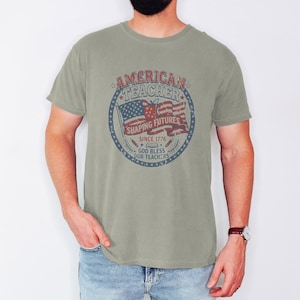 Vintage American Teacher Shirt, Patriotic USA Flag, Shaping Futures Since 1776 Tee Sandstone