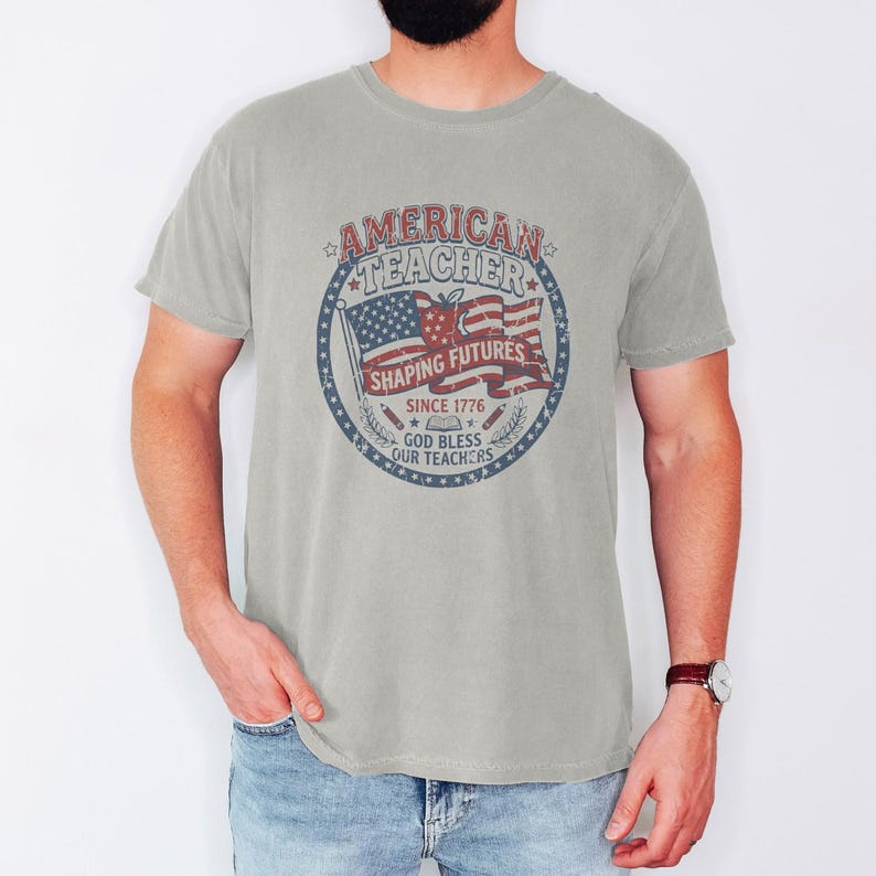 Vintage American Teacher Shirt, Patriotic USA Flag, Shaping Futures Since 1776 Tee Ivory
