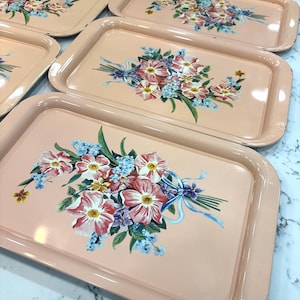 Vintage mid century peach/pink floral retro metal lap trays. Set of 5 MCM TV trays Aproximately 14.5in x 9in.