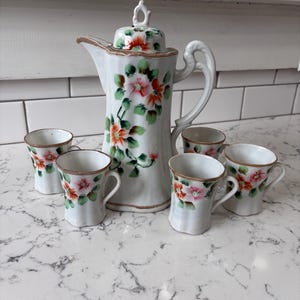 Nippon Handpainted tea or chocolate set from pre war Japan. Tall serving pot for tea, coffee, or chocolate with 5 small 4oz cups.