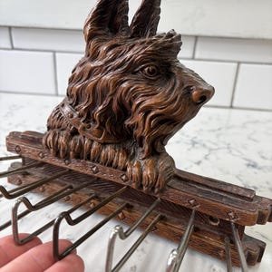 Vintage Syroco wood Scottie Dog tie and belt holder. wall mounted hooks.
