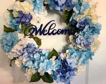 18” Blue and white very full floral “Wecome” front door wreath